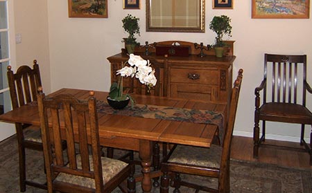 Antique table and chairs and sideboard