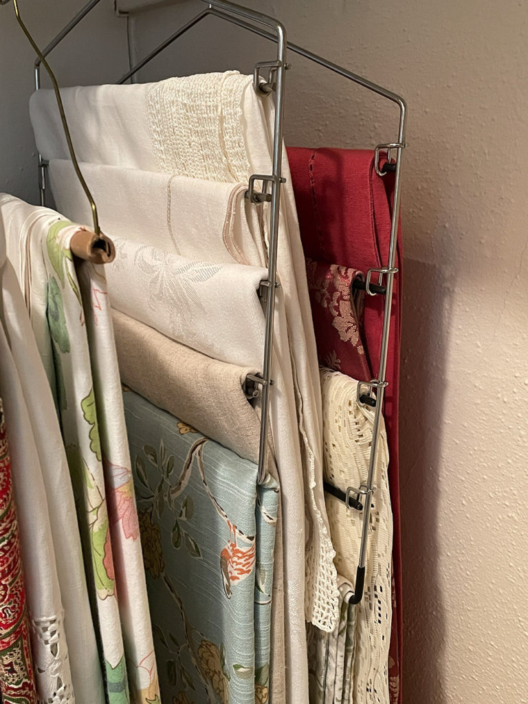 pant hangers for tablecloth storage